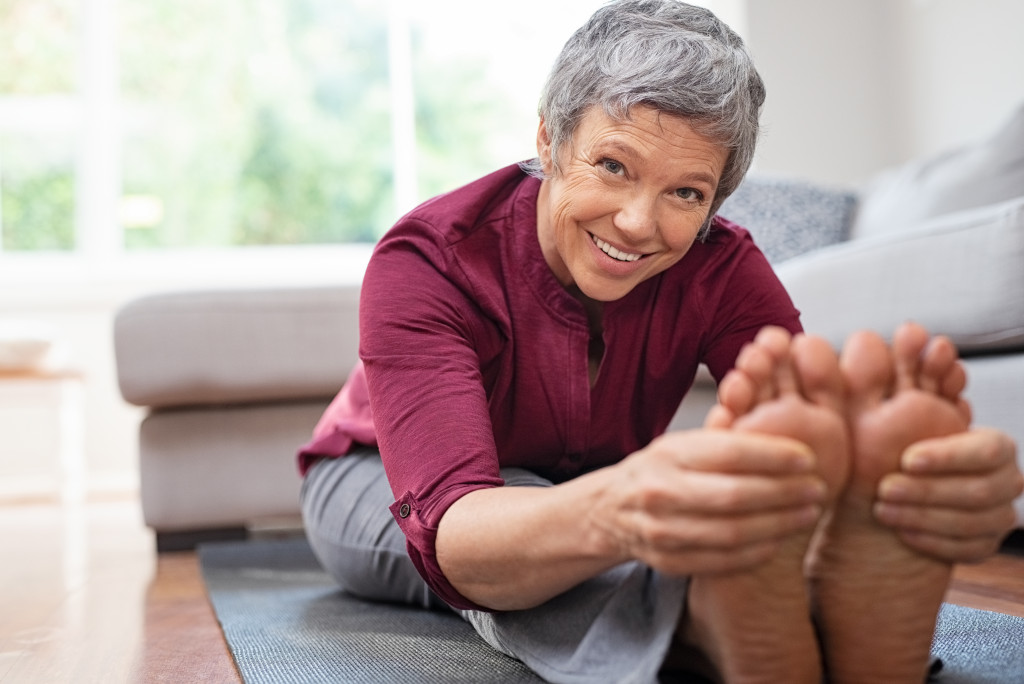 Exercising old woman